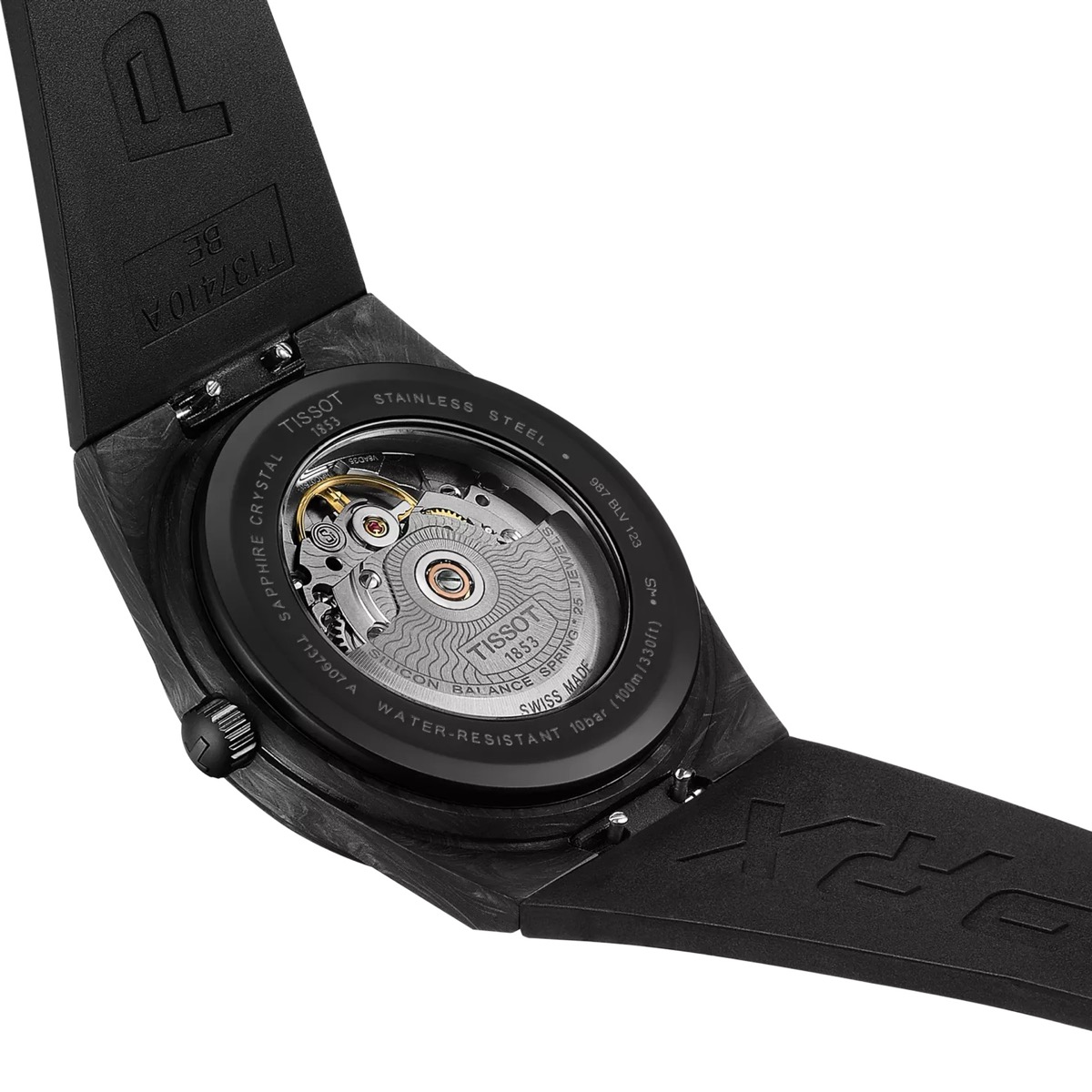 Vue arrière de la montre Tissot PRX Powermatic 80 Carbone, montrant le mouvement automatique à travers le fond saphir et le boîtier en composite de carbone noir.
